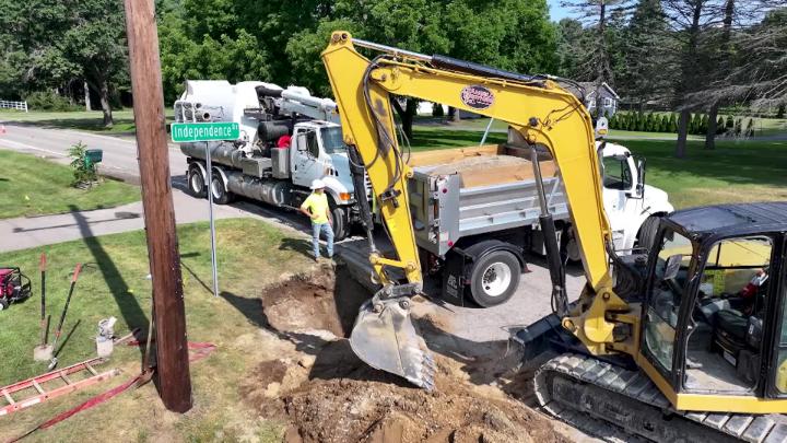 An arieal shot of emergency crews working on the site of a water main break. 
